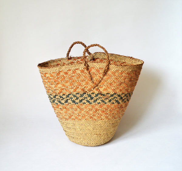 Vintage basket for rustic decor orange color