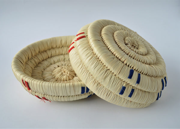 Natural wicker candy plate, decorated with colored fabric