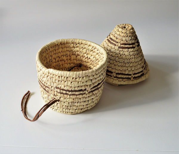 Woven palm leaf basket, Straw and leather wicker