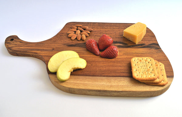 Rustic rosewood cutting board, organic shape, cut of one piece of wood