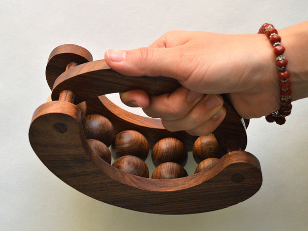 Wooden massage tool with 10 rolling balls