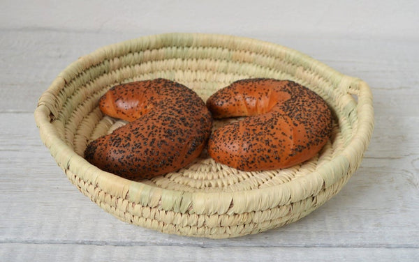 Round bread platter from palm leaves