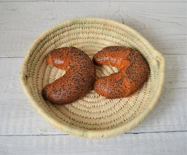 Round bread platter from palm leaves