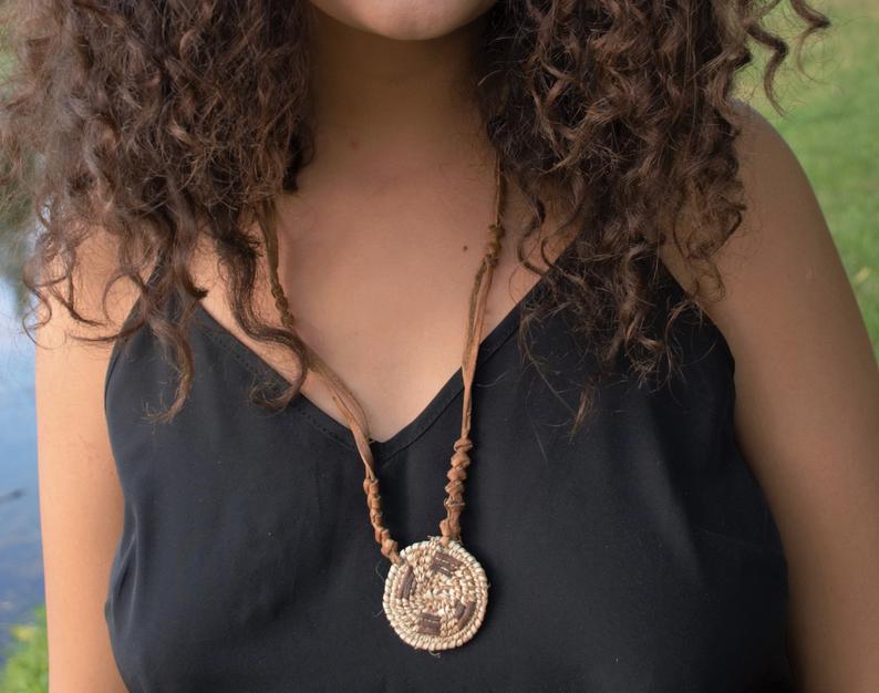 African necklace from natural leather and palm straw