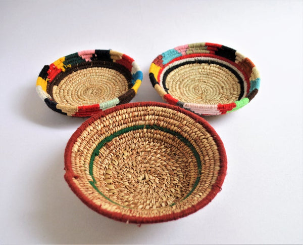 Tribal woven wall plates with wool decoration