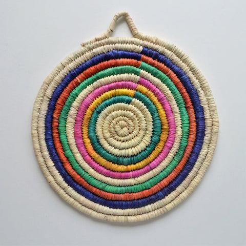 Pink round wall basket trivet